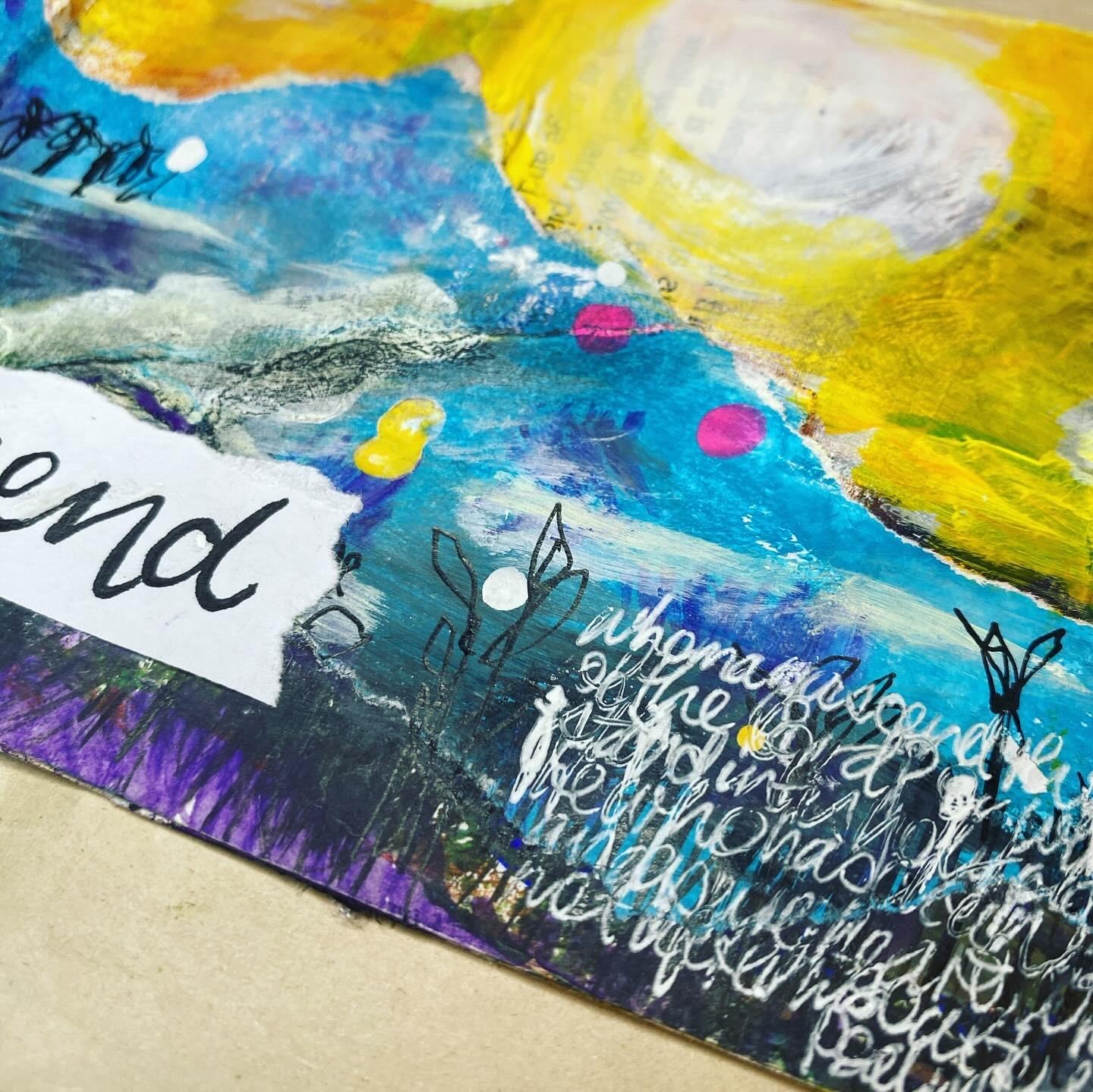 Vibrant art journal page with blue, yellow and purple paint and white Scripture text