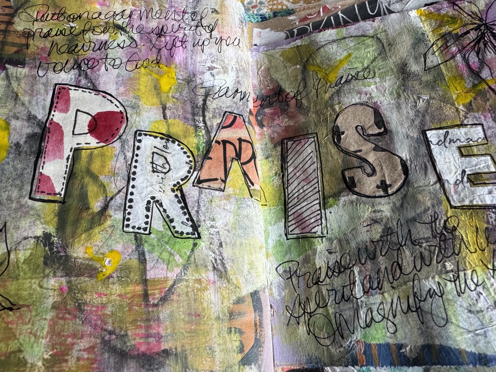 Art journal page with PRAISE lettering in mixed media — garments of praise